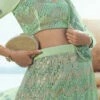 Green Net Designer Umbrella Lehenga Wedding Wear 1 Green Net Designer Umbrella Lehenga Wedding Wear -ZariGrace Shop green net designer umbrella lehenga ghscc40865103 l