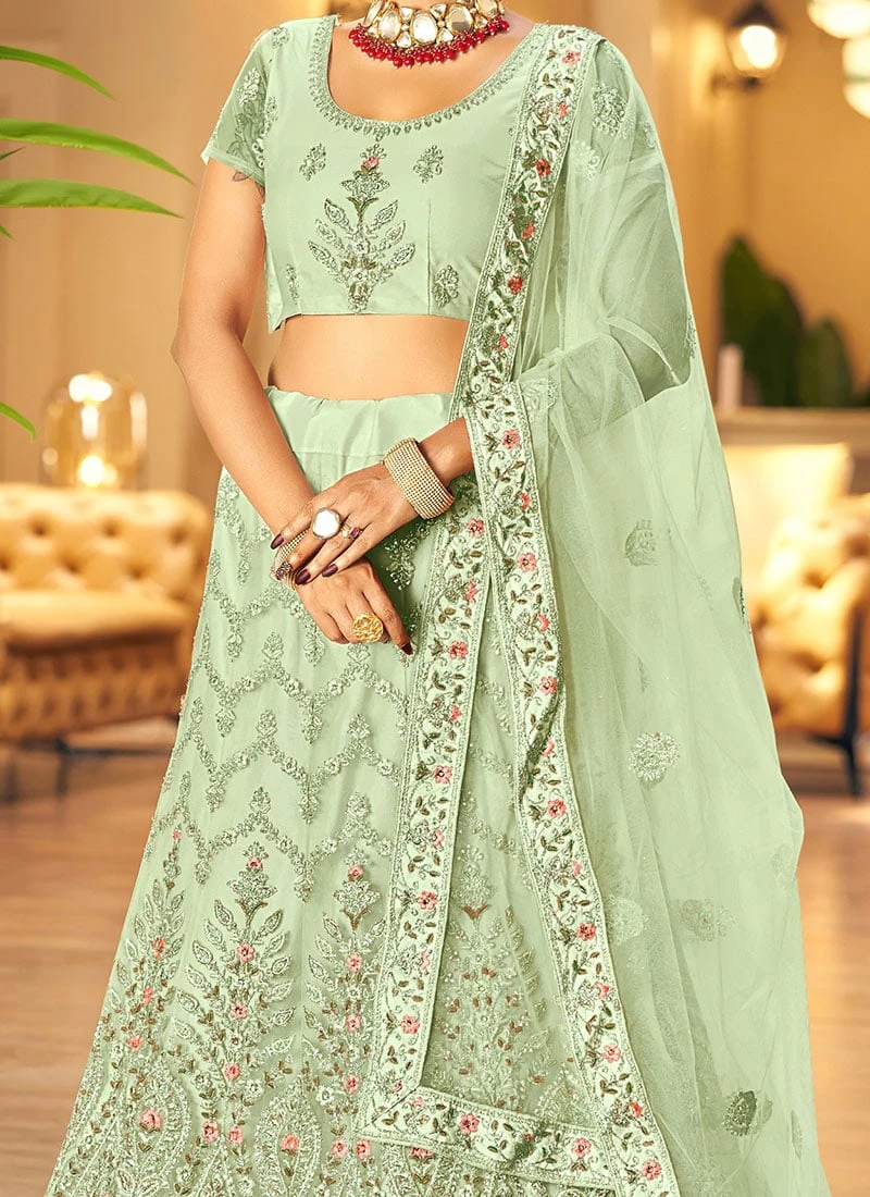 Pista Green Embroidery Stone Work Net A Line Lehenga Party Wear 3 Pista Green Embroidery Stone Work Net A Line Lehenga Party Wear